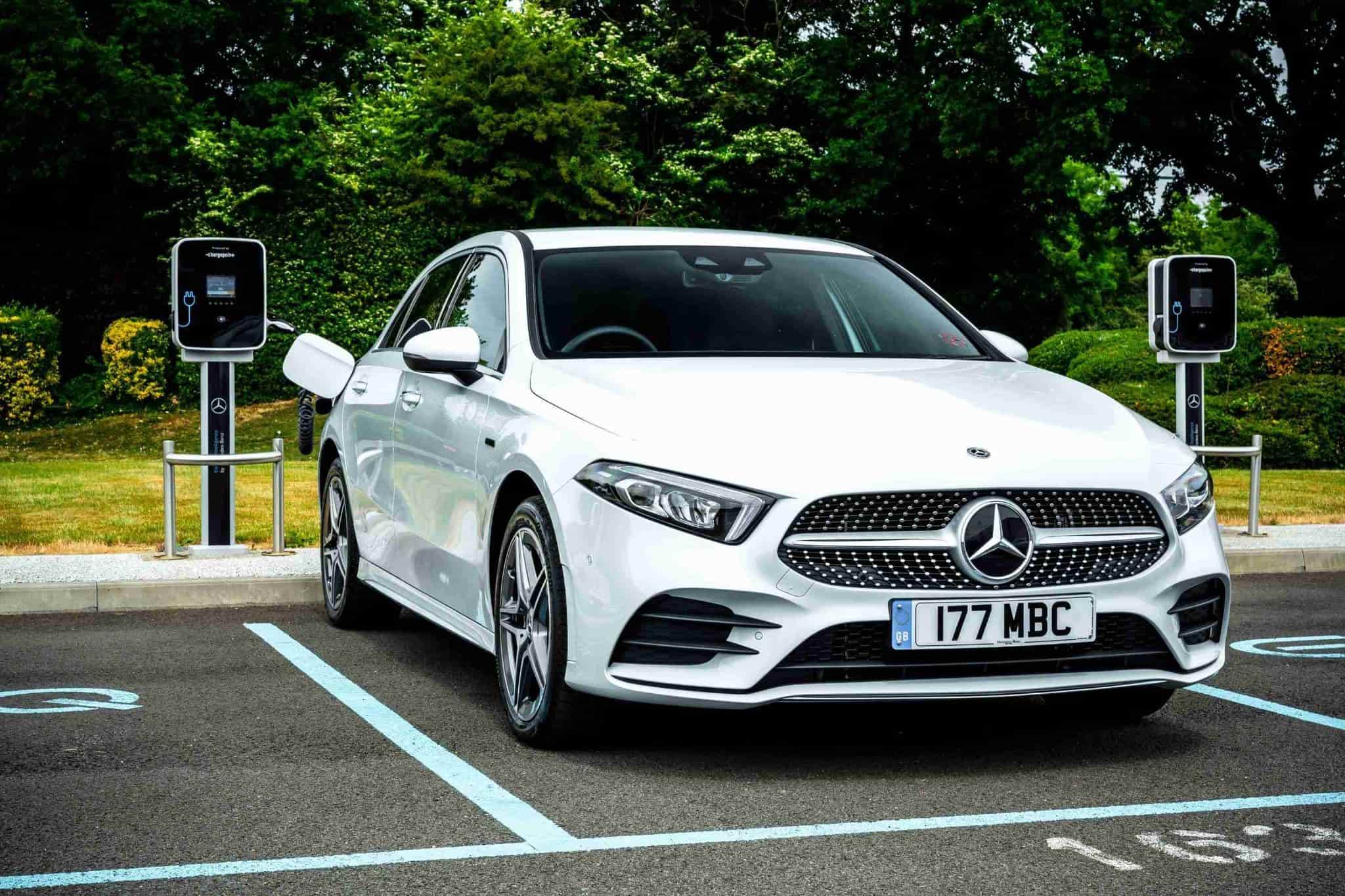 White Mercedes Benz A Class Parked Up by EV Charging Station