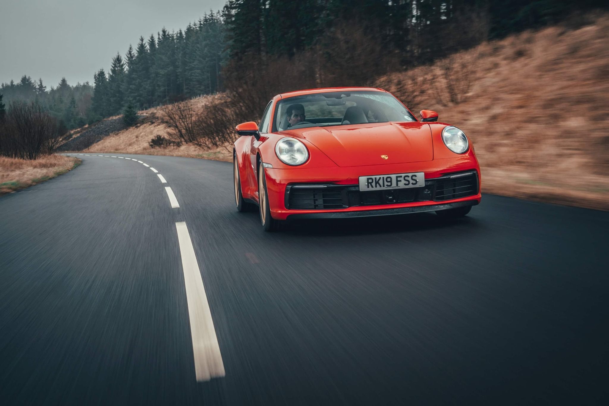 Red Porsche 911 Driving Towards the Camera
