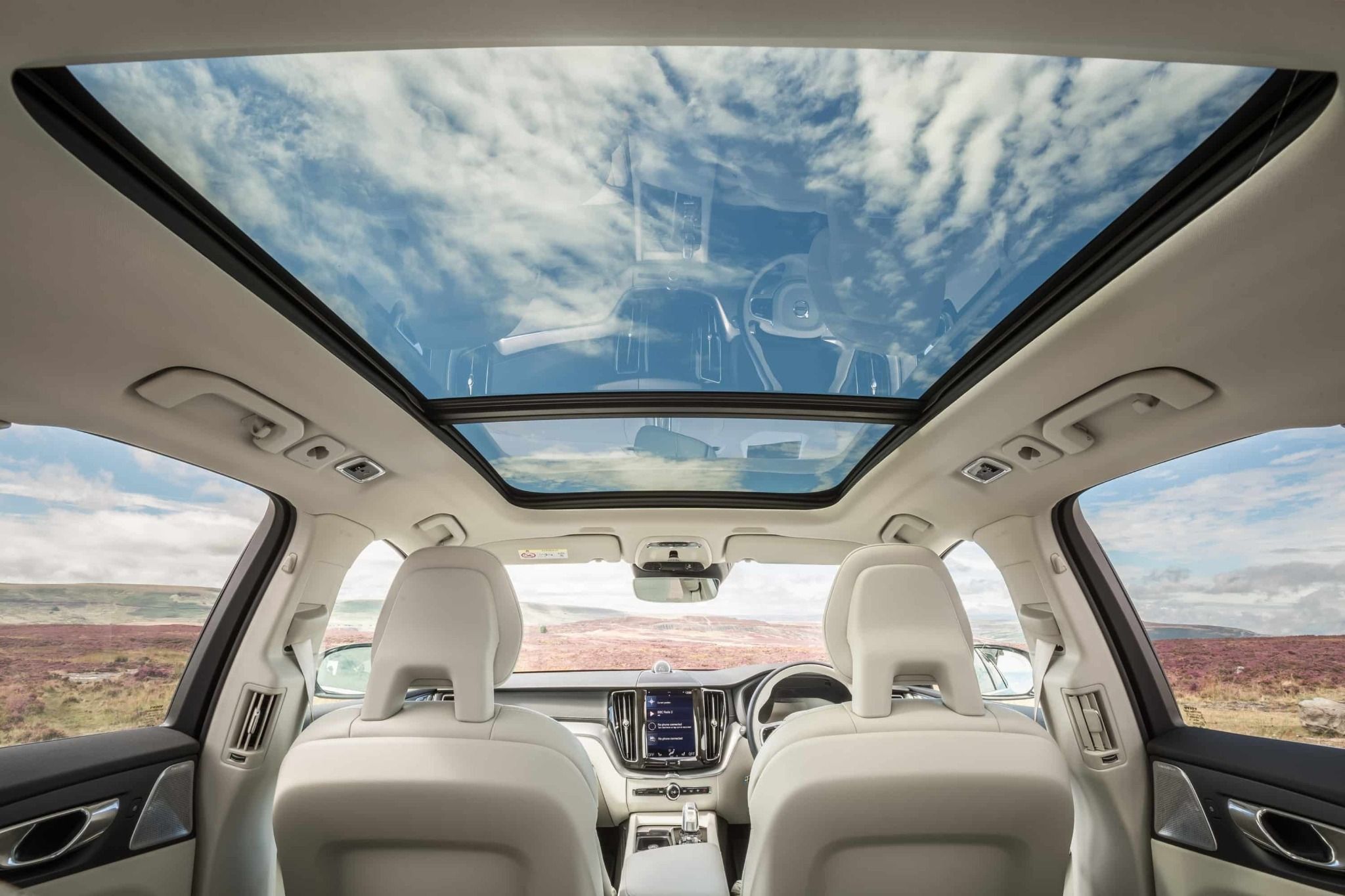 Interior of a Volvo XC60 With A Focus On The Sunroof During A Sunny Day