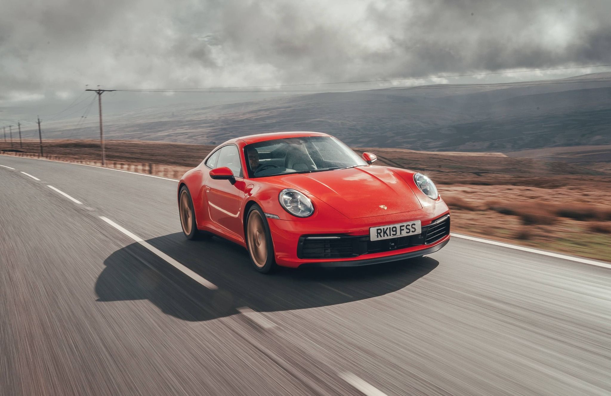 Red Porsche 911 Driving