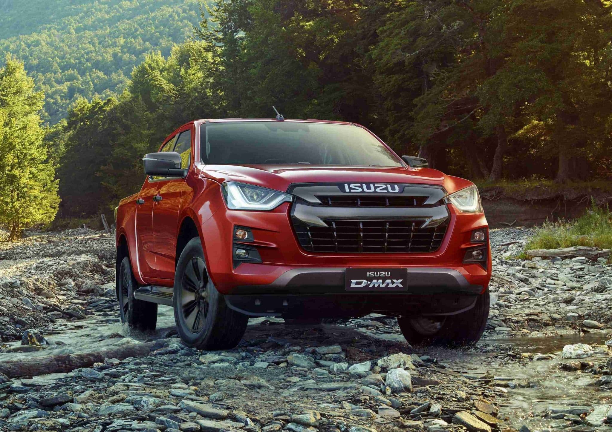 Red Isuzu D Max Off Roading