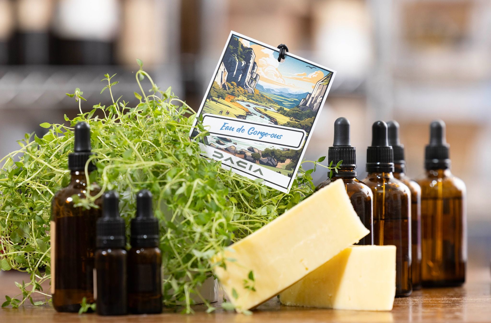 Dacia sir freshener: Eau de Gorge-ous displayed with thyme, cheddar cheese and bottles of essential oil