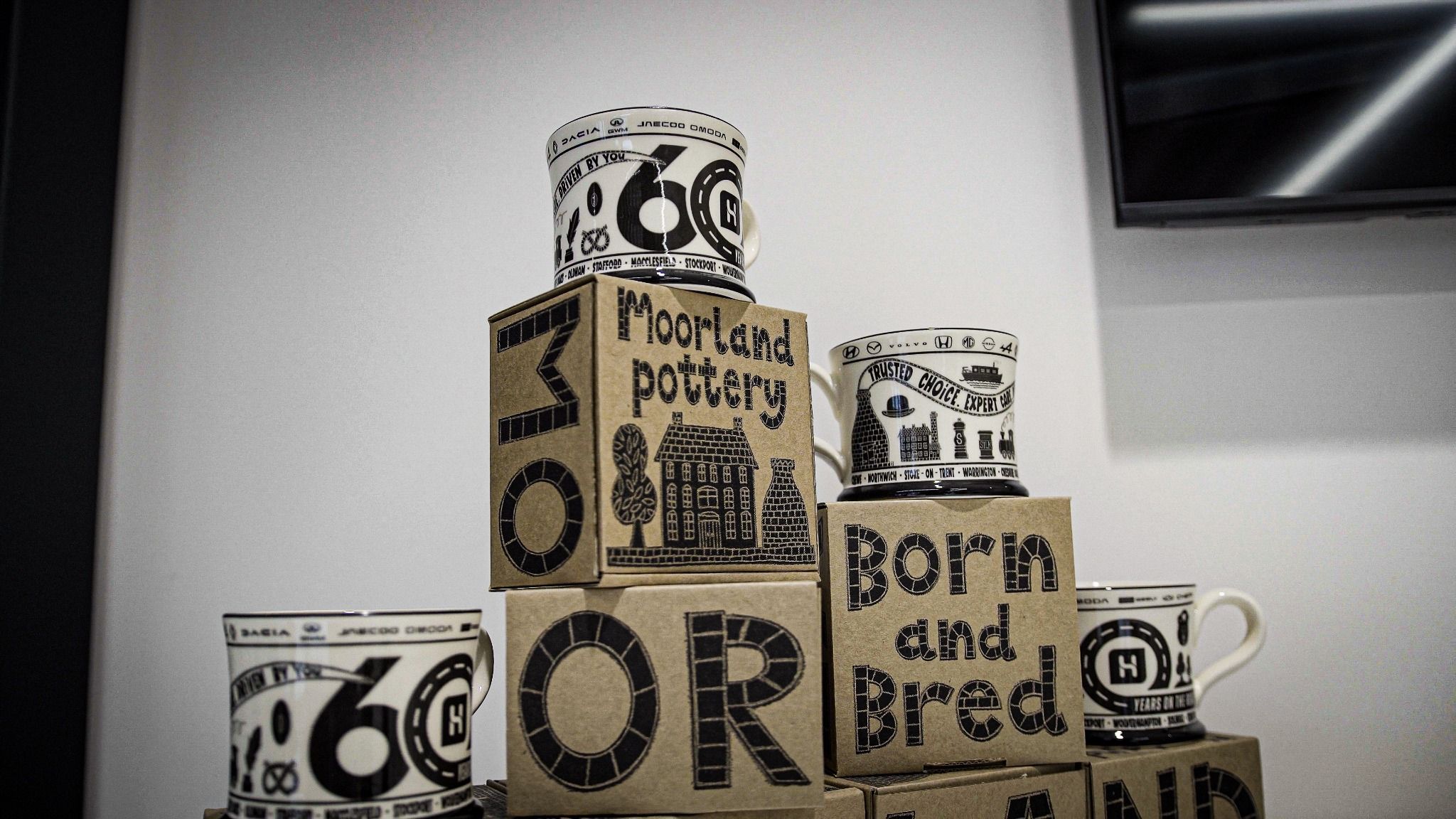 60th anniversary mugs, specially crafted by Moorland Pottery