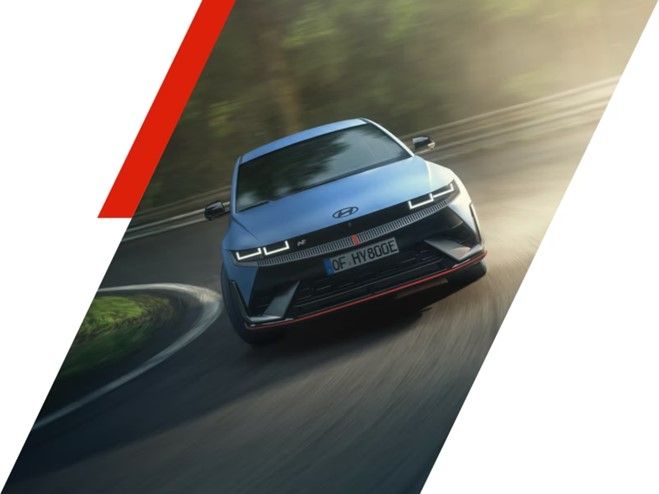 Blue IONIQ 5 N driving round a corner.