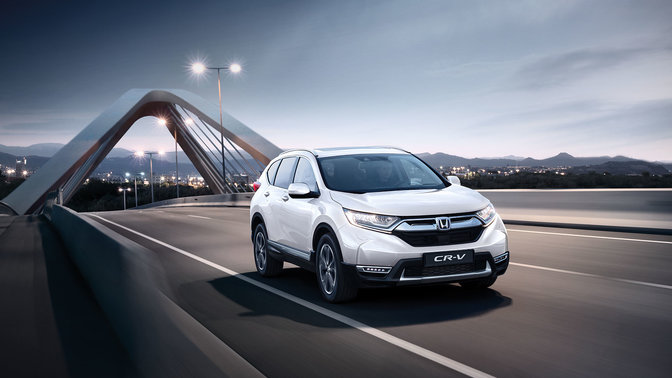 Honda CR-V driving across a bridge