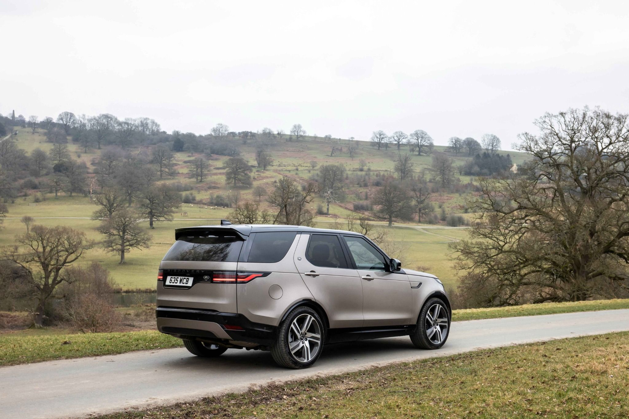 Side view of Land Rover Discovery driving