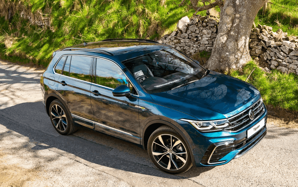 Volkswagen Tiguan Driving Down Road